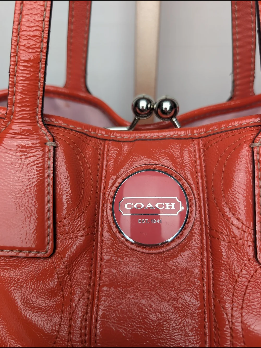 Coach Coral Leather Satchel with Signature Stitching